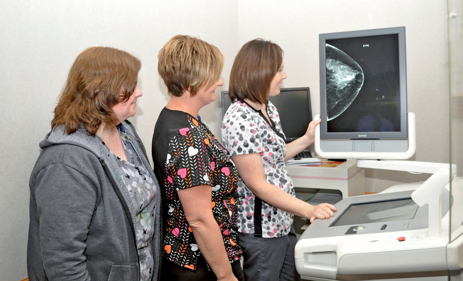 Radiology nurses at Franciscan St. Elizabeth Health - Crawfordsville (from left) Karen Brosman, Rachelle Williamson and Brooke Brownfield explain the new 3D mammogram technology that will be available to the public on Monday.
