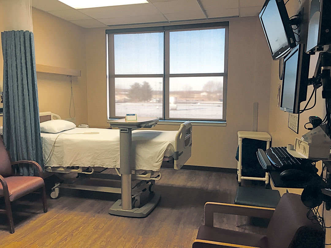 Patient rooms will be renovated with new beds, new window coverings and new flooring, as shown in the room pictured.