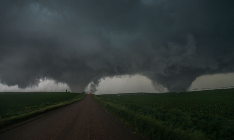 Twin tornadoes killed two people and damaged dozens of homes Monday in Pilger, Neb.