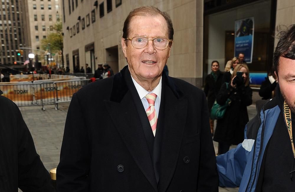 Sir Roger Moore's daughter believes he's visiting her from beyond the grave