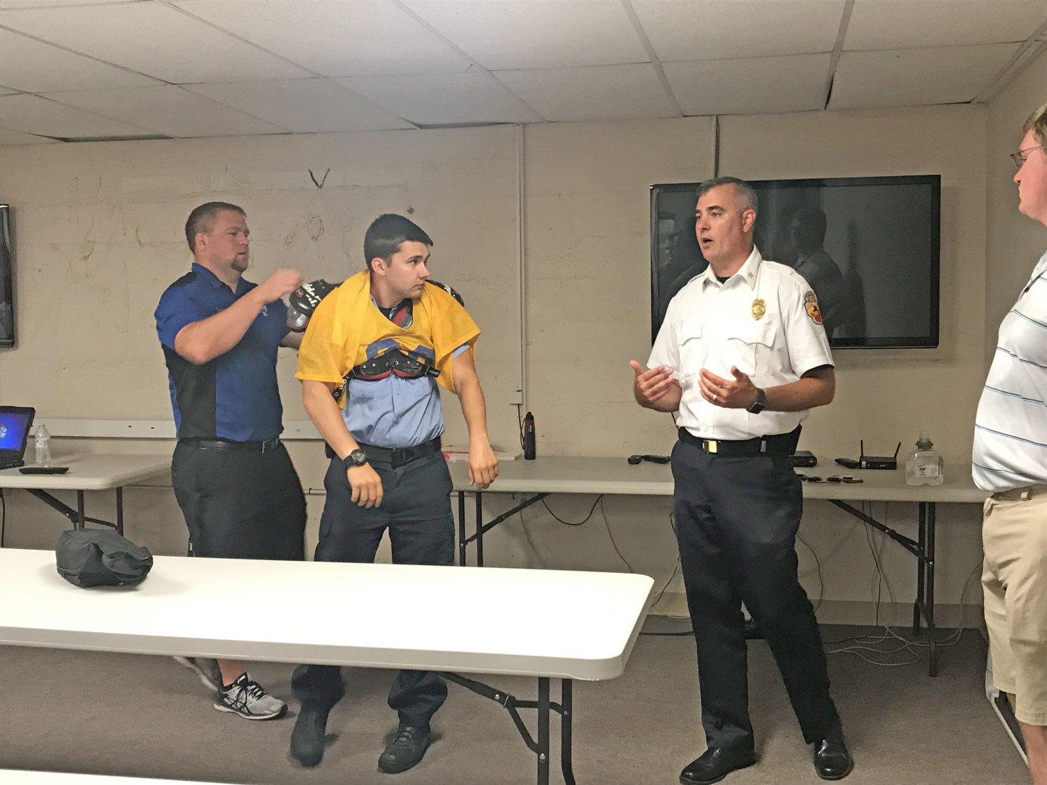 Paul Miller, the Division Chief of EMS for the Crawfordsville Fire Department, addresses medics during training Wednesday. Doug Horton (left), the Athletic Trainer at Crawfordsville High School, talked to medics about how athletic trainers care of injured athletes. Also pictured is Nathaniel Busenbark (center), a Crawfordsville firefighter/paramedic.