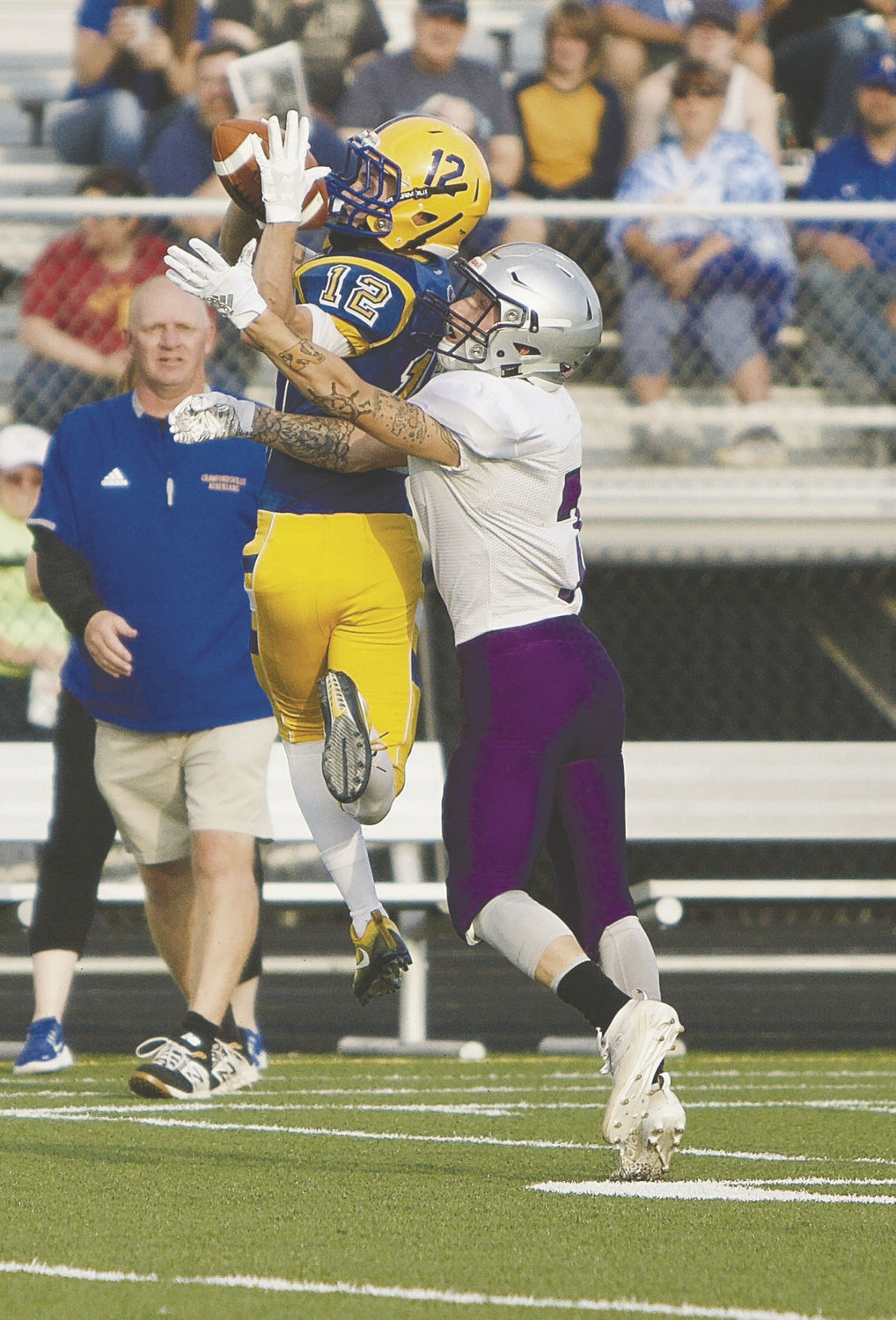 Crawfordsville's Andrew Martin snags a pass. The junior caught the Athenian's lone score on the night.