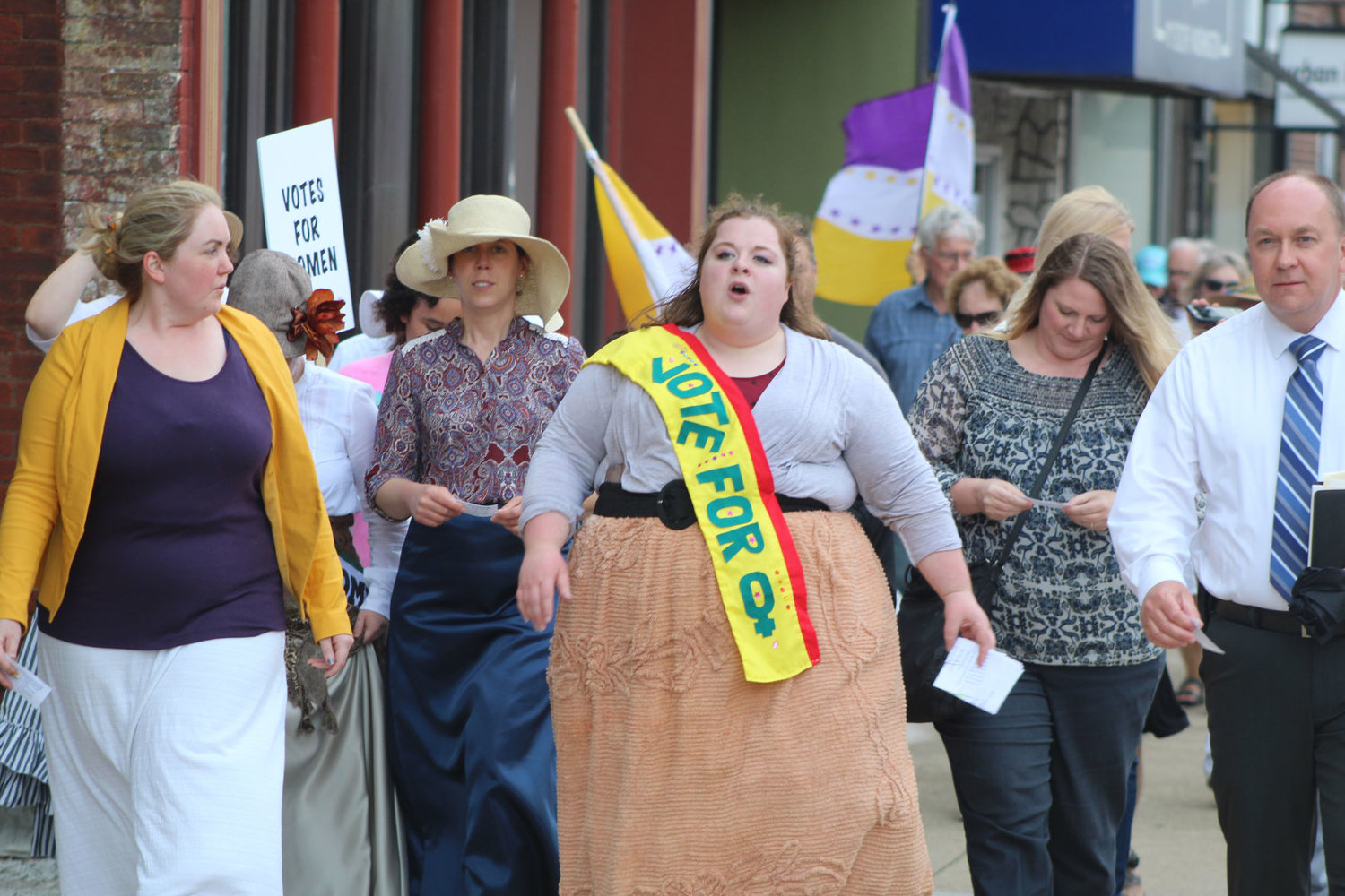 Mary Taylor, center, leads a march celebrating the 99th anniversary of women's suffrage, joined by Emily Race, Kelli Bowling, Summer Ervin and Mayor Todd Barton Monday in downtown Crawfordsville. The march kicked off a series of events marking the suffrage centennial in 2020.