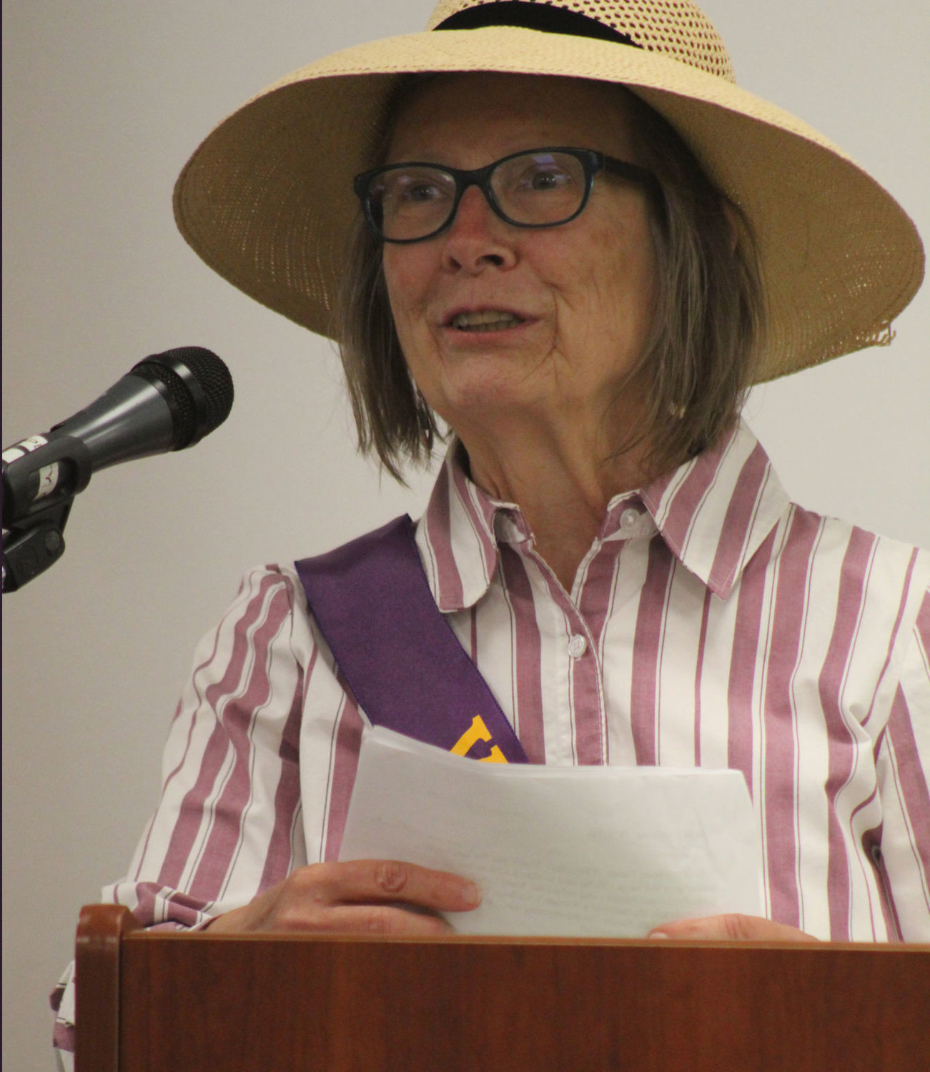Helen Hudson, president of the League of Women Voters of Montgomery County, speaks at the kickoff event for the women's suffrage centennial Monday at the Crawfordsville District Public Library.