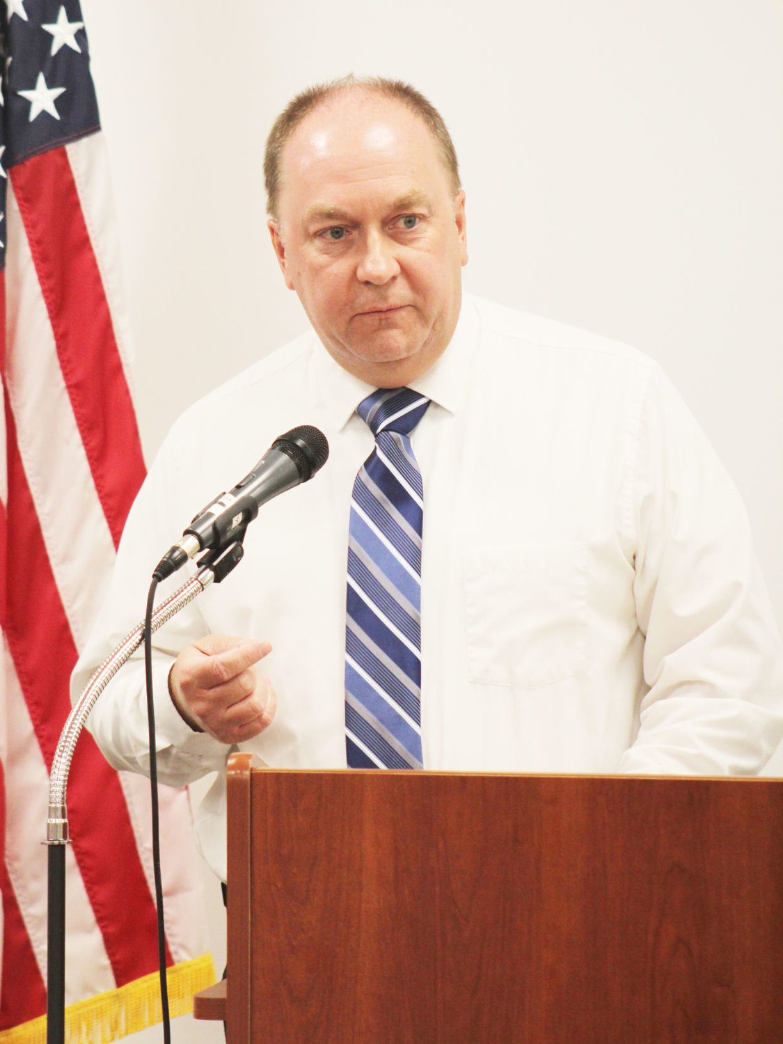 Mayor Todd Barton speaks Monday at the kickoff celebration for the women's suffrage centennial at the Crawfordsville District Public Library.
