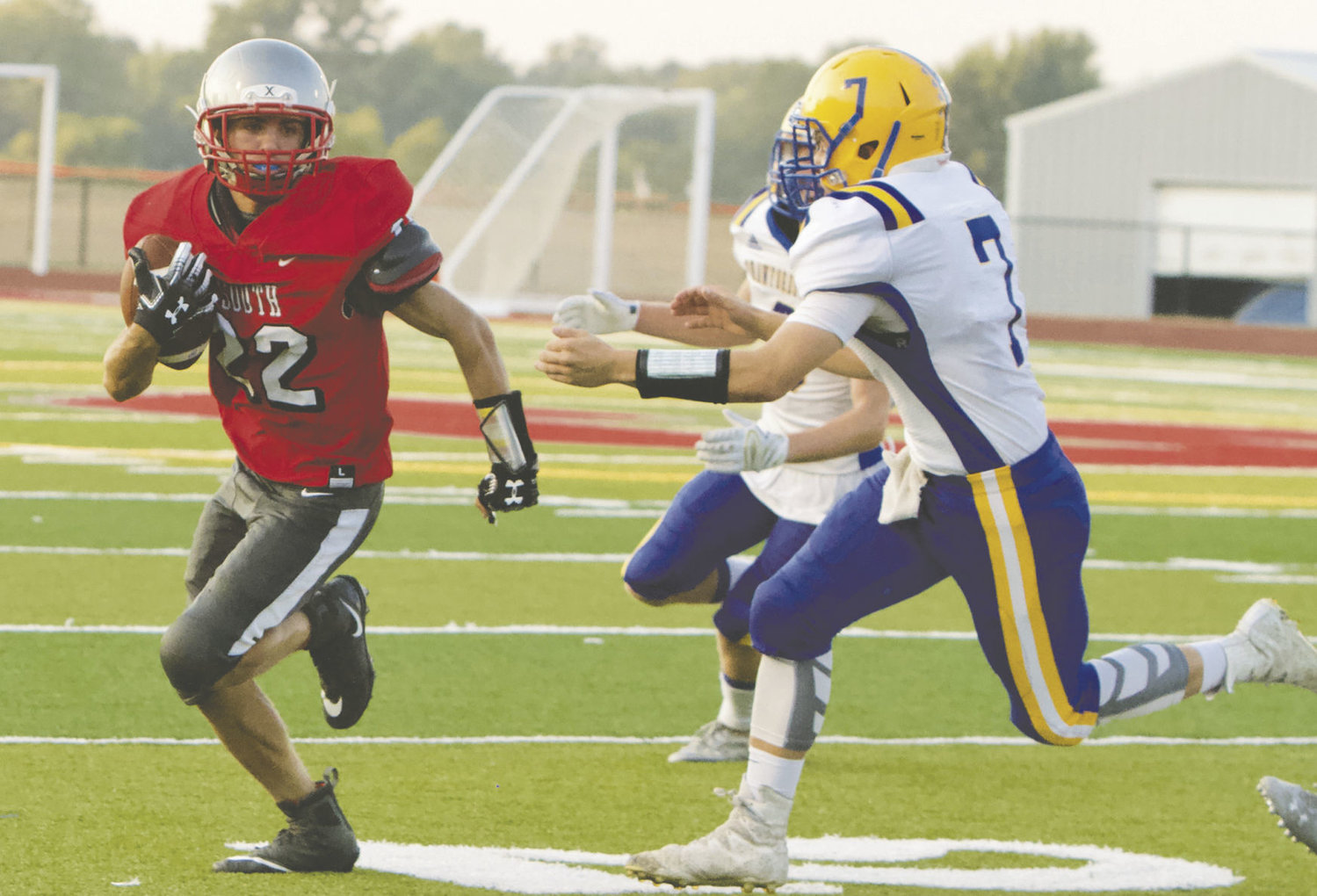 Dillan Lauy carries the ball for the Mounties in a game earlier this season against Crawfordsville.