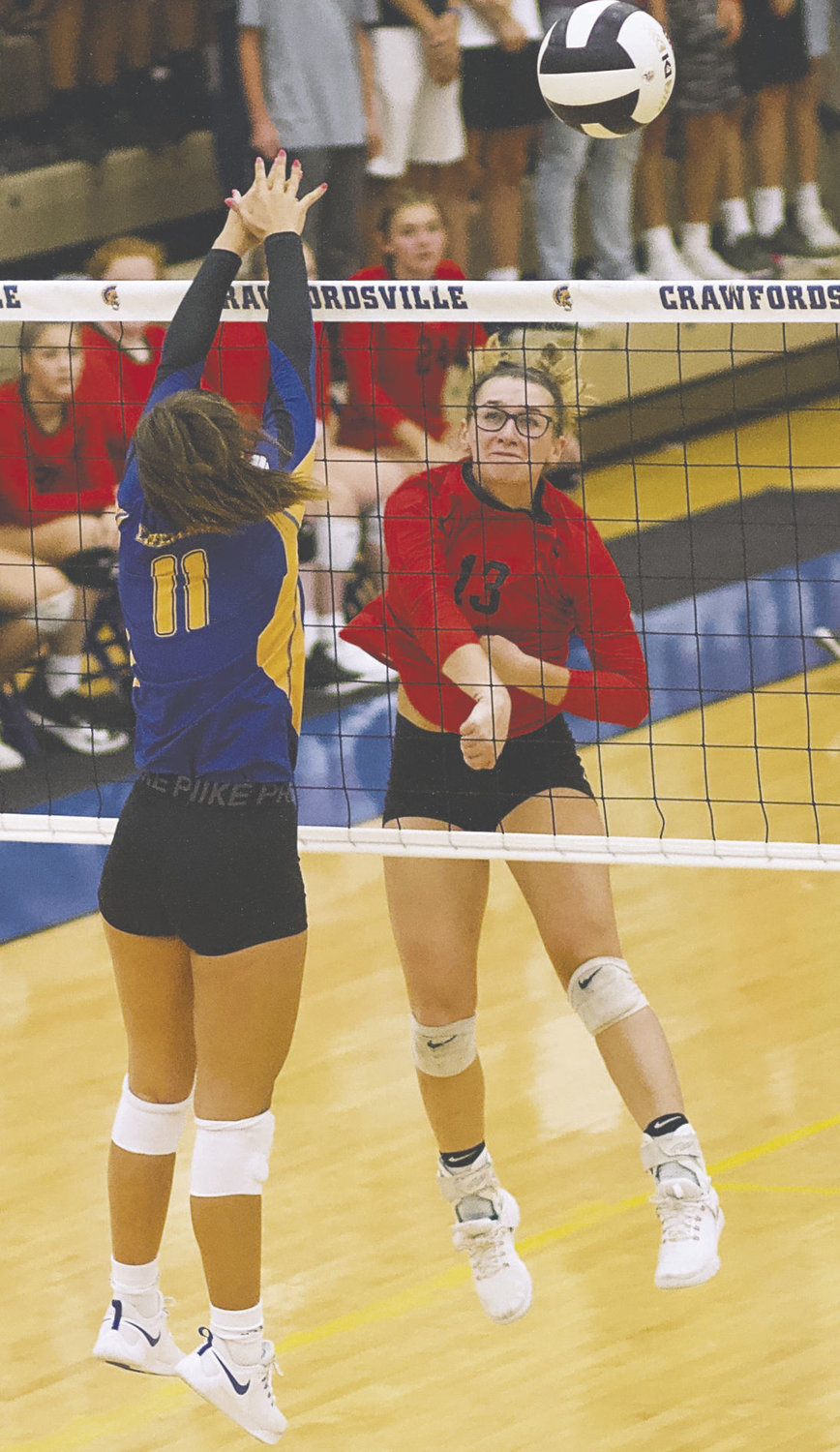 Southmont’s Kaley Remley hits over Crawfordsville’s AlyxBannon in a game earlier this season.