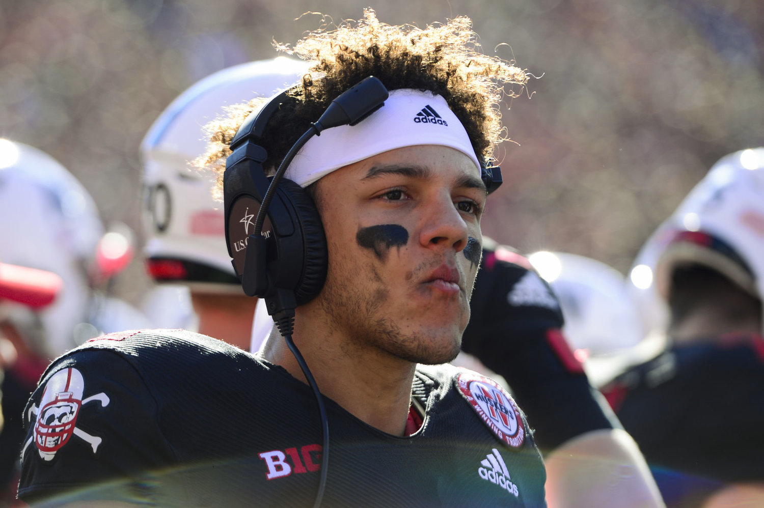 Nebraska quarterback Adrian Martinez seen with a headset on the sideline during first-half action against Indiana Saturday at Memorial Stadium. 