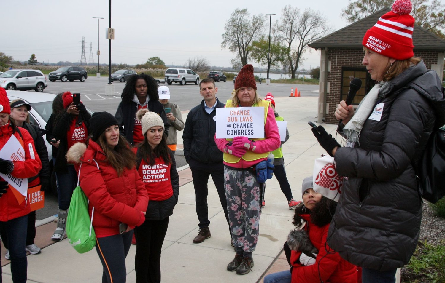 Sue Eleuterio, right, Indiana legislative lead for Moms Demand Action of Northwest Indiana, addresses participants in Saturday’s Moms Demand Action march from Hammond to Chicago to promote gun safety and related legislation.