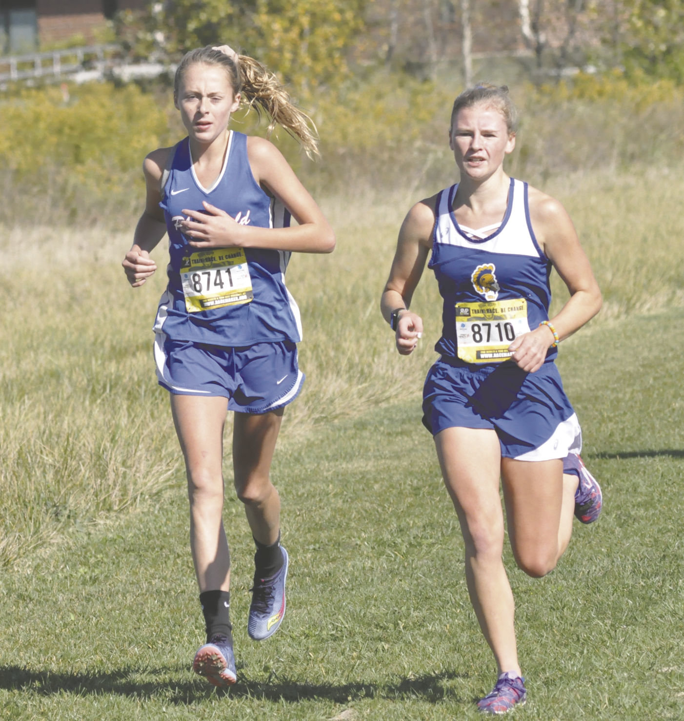 Crawfordsville's Madison Fry, right, pulled away from the majority of the field to place second overall at the IHSAA Sectional on Saturday a Brownsburg.