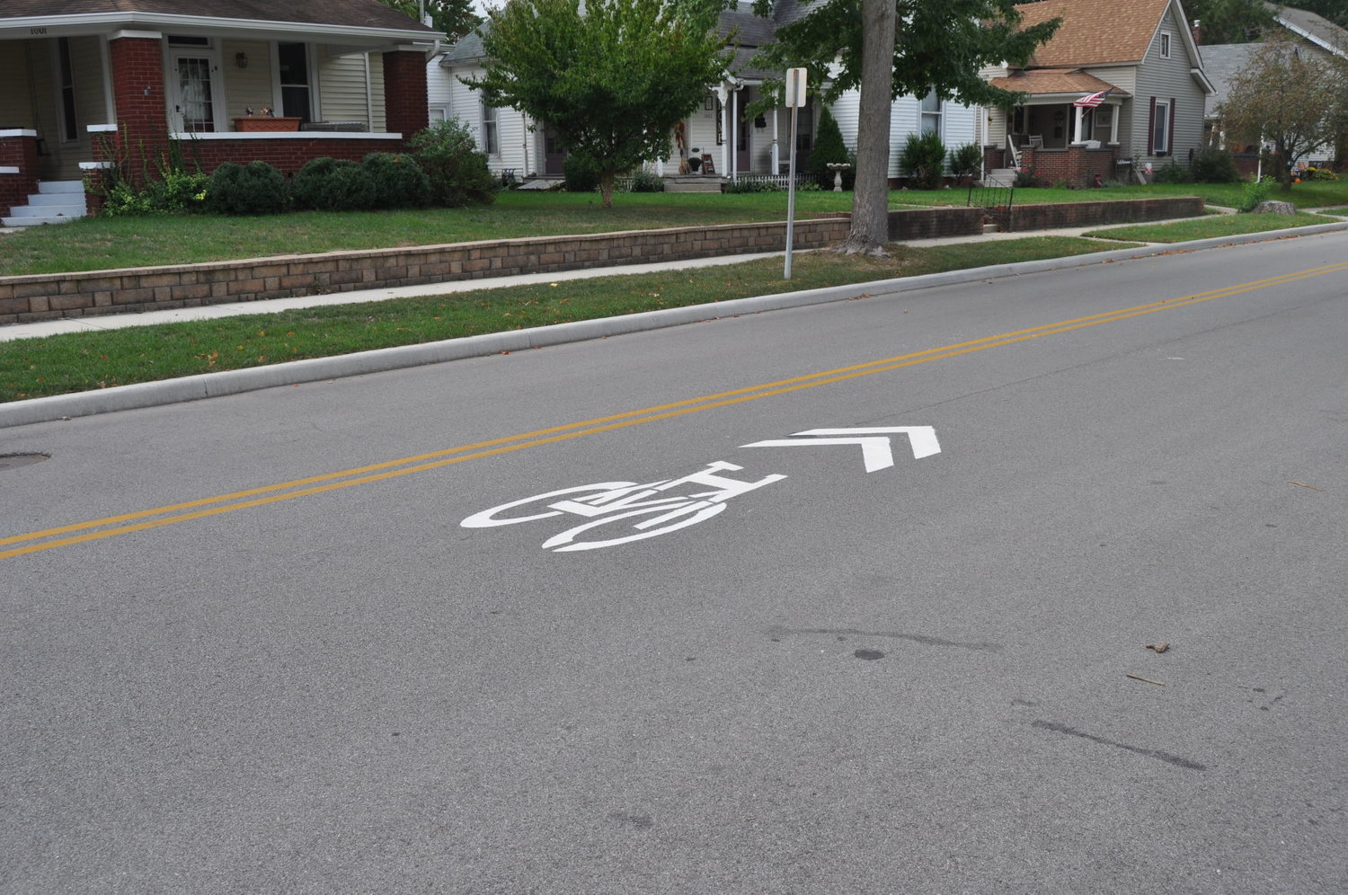 Bike arrow markings have been painted on city streets to help identify the bike path.