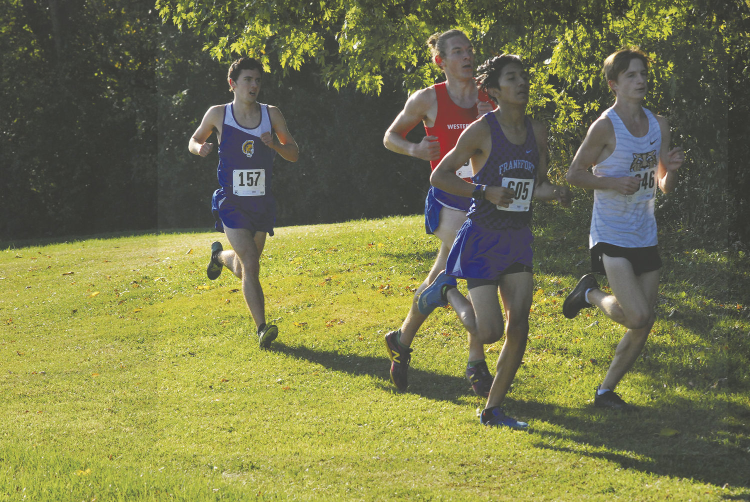 Crawfordsville's Drake Hayes stays with the front pack. Hayes finished 4th overall in the boys' race.