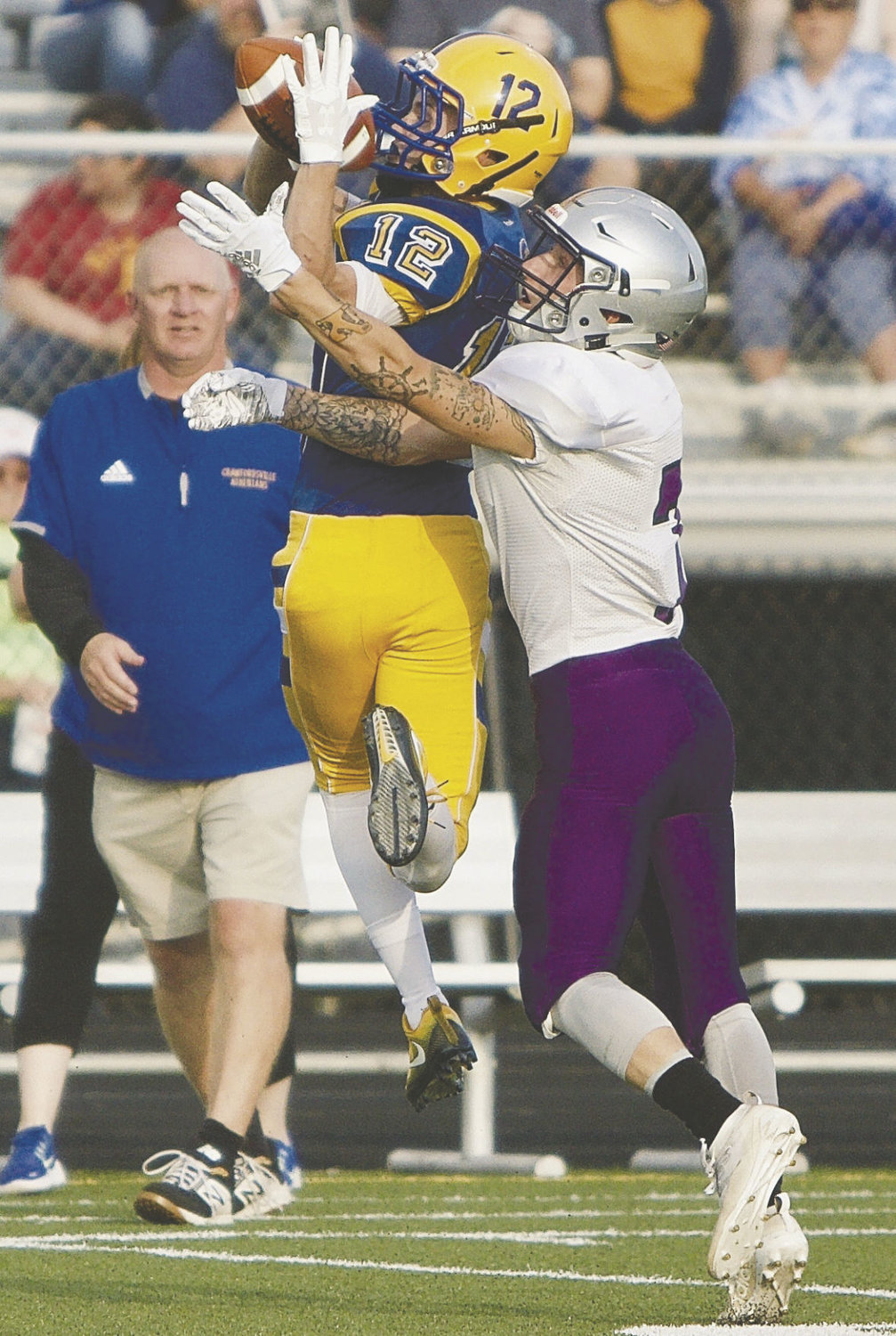Crawfordsville first-year coach Kurt Schlicher as he looks on at Andrew Martin making a grab.