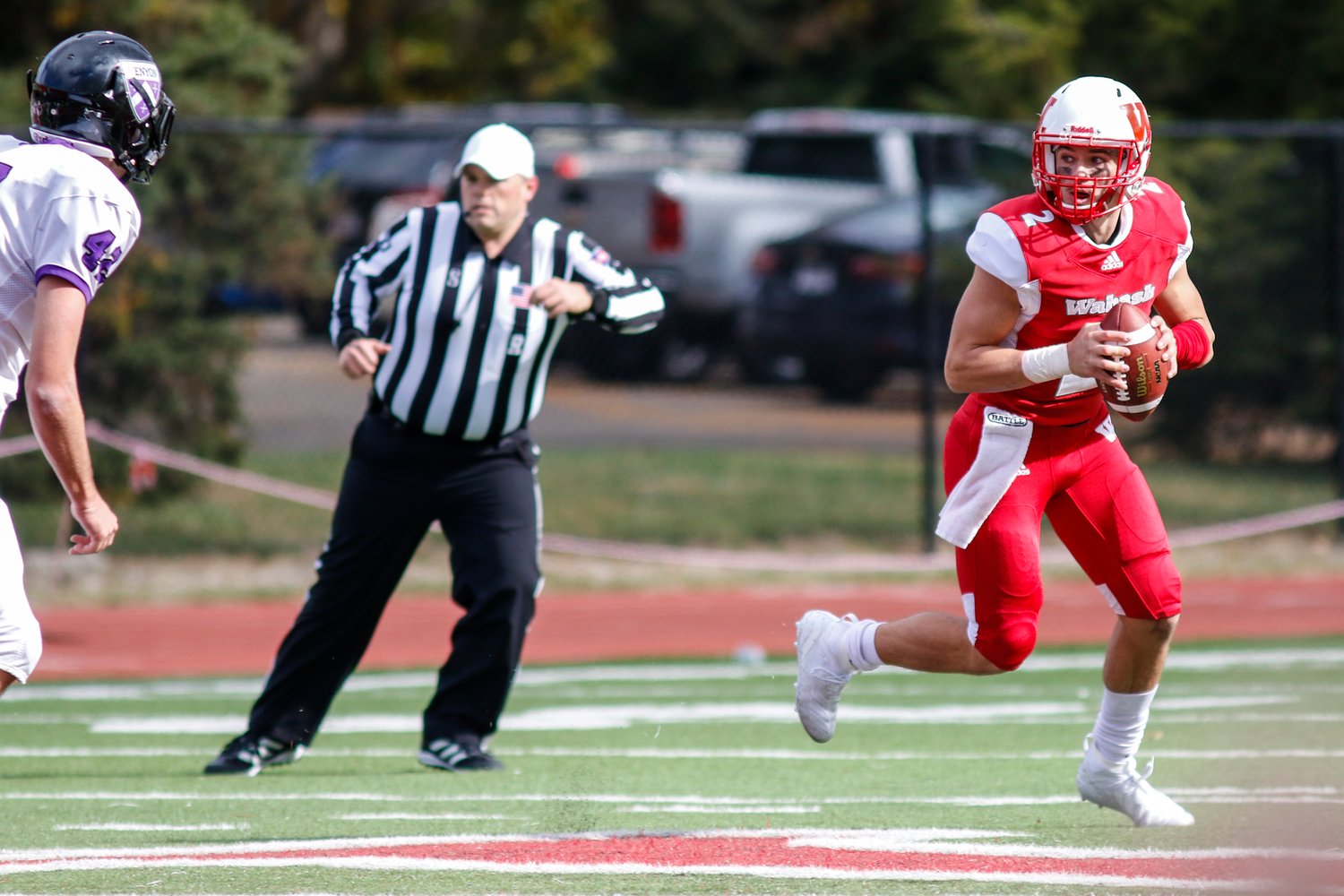 Wabash QB Liam Thompson looks downfield for an open receiver.
