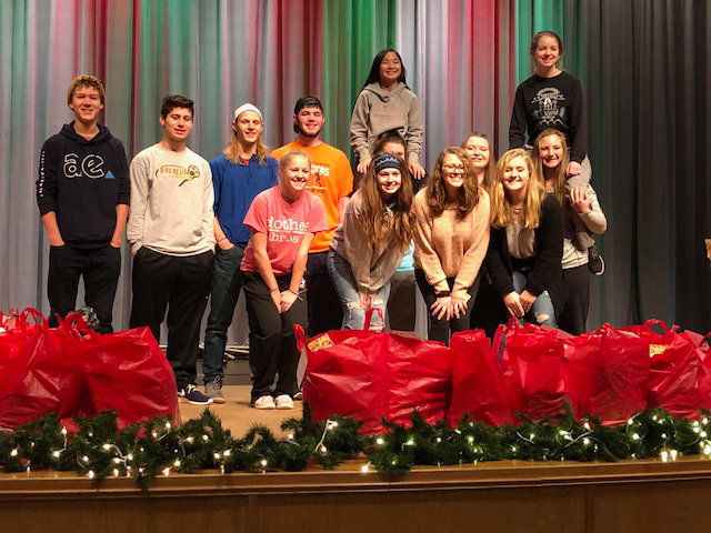 Members of North Montgomery High School service organization wrapped gifts last December for Volunteers for Mental Health in Montgomery County.
