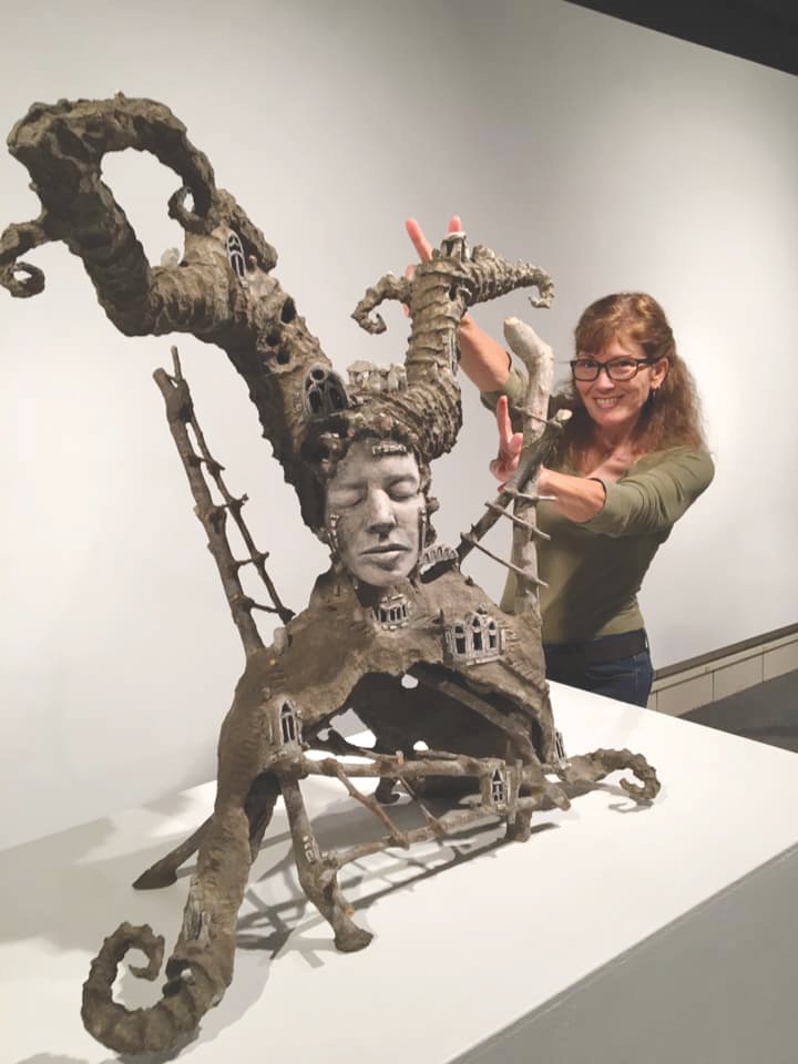 Pamela L. Deaton with one of her sculptures.
