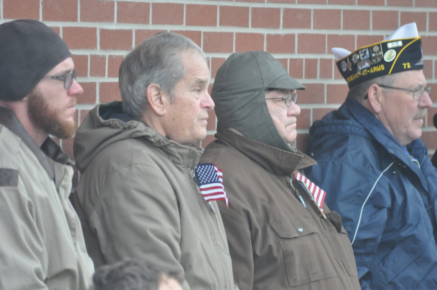 Veterans listen to the community Veterans Day service Monday at Pike Place.