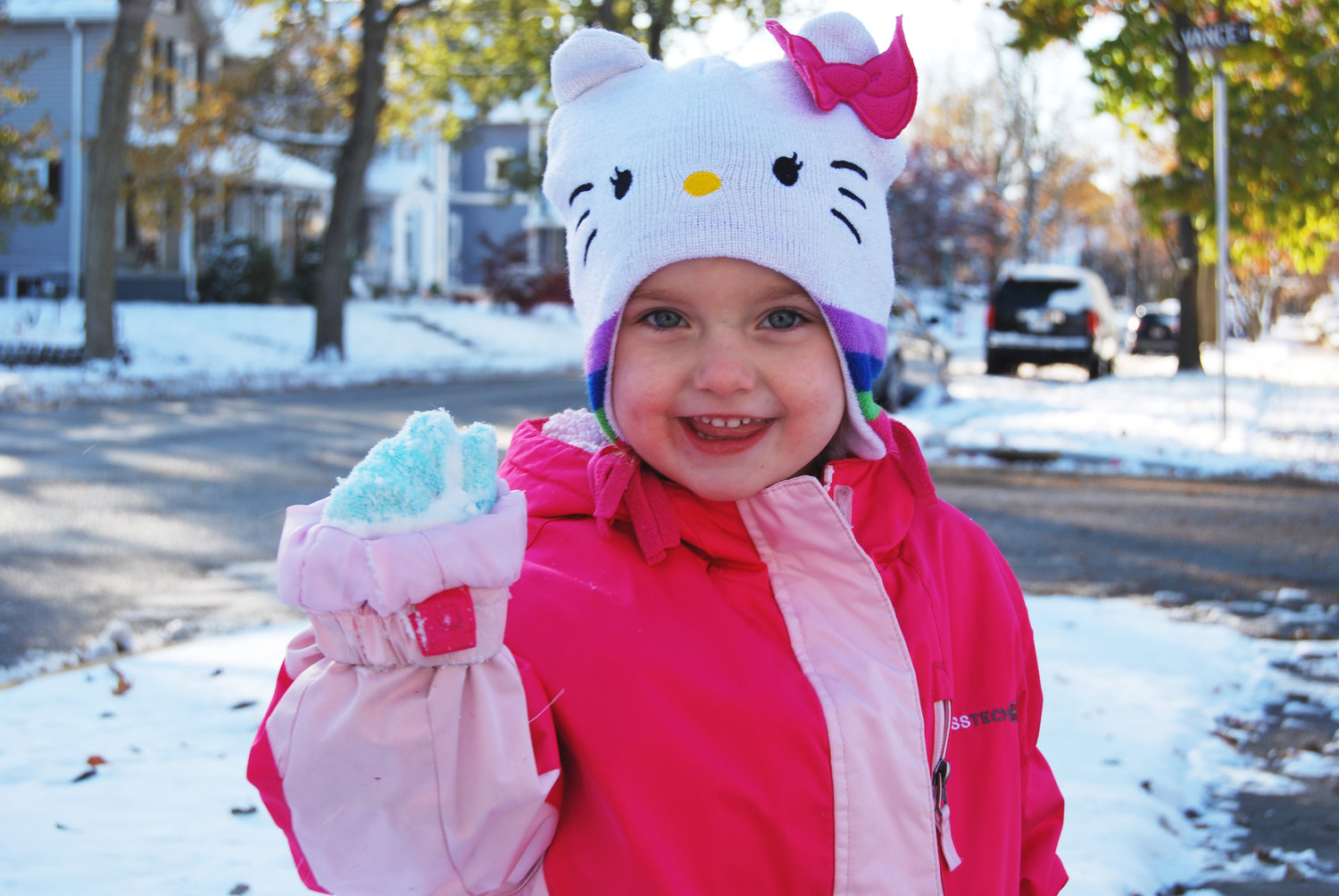 Clara Brown was outside Tuesday afternoon enjoying the first snowfall of the season. She was making and throwing snowballs at those passing by.