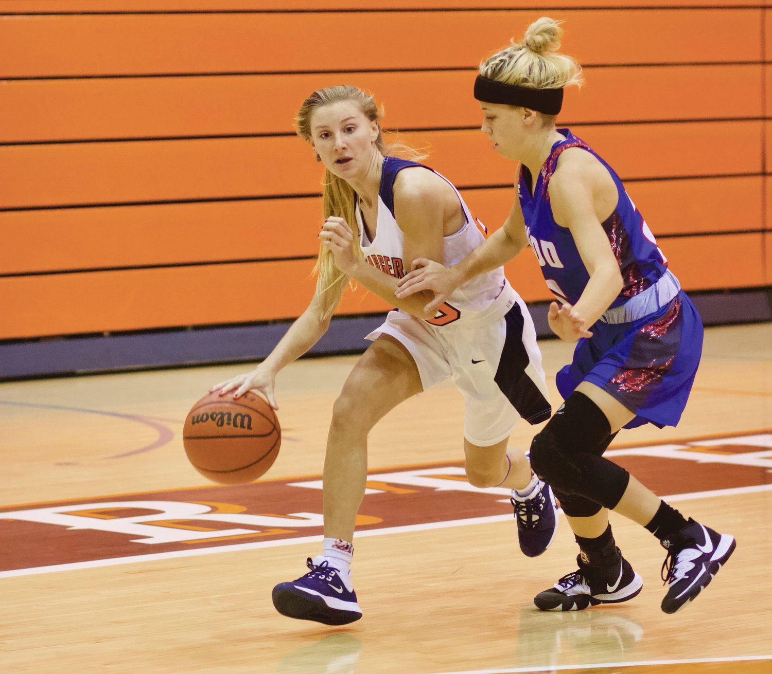 Grace McClaskey drives to the hoop in North Montgomery's 54-28 win over Elwood.
