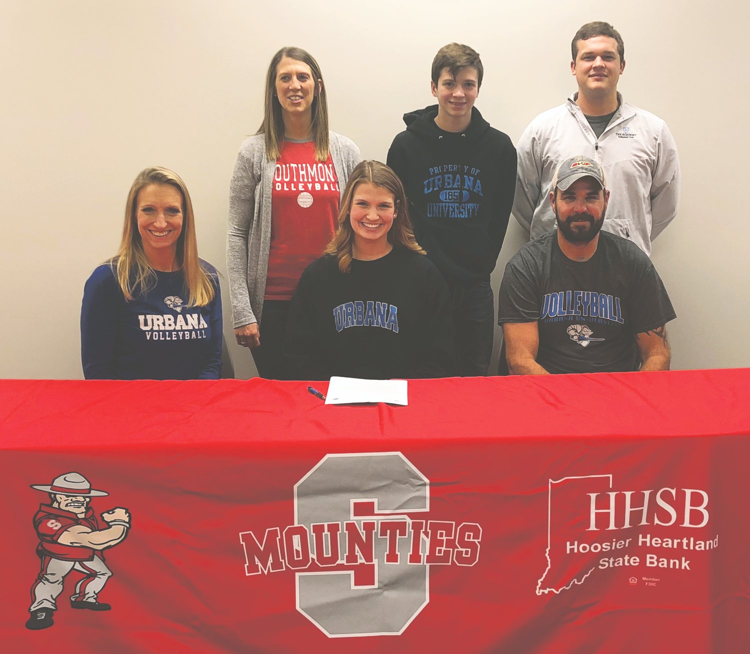 Southmont senior Lexi Nelson is joined by parents, Matt and Kathleen Nelson, brother, Ethan Nelson, high school coach, Lauran Nichols, and club coach, Andrew Fuller, as she signed her National Letter of Intent to continue her volleyball career at Urbana University.