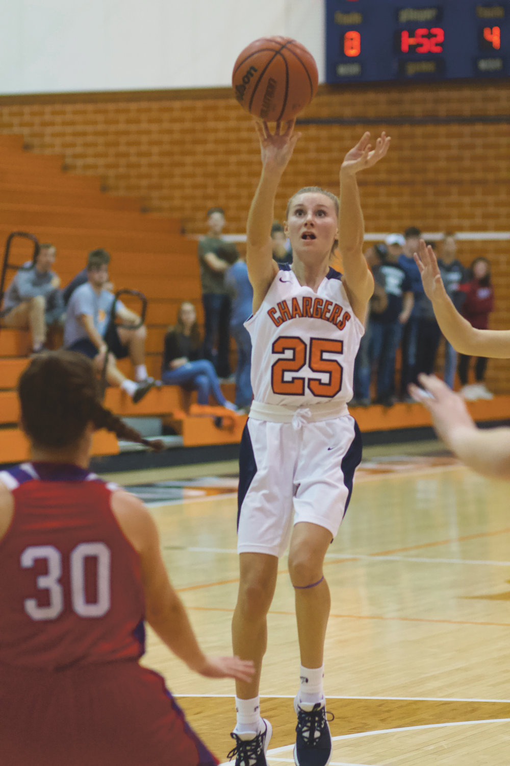 North Montgomery's Grace McClaskey fires up a shot in the Chargers' loss to Western Boone.