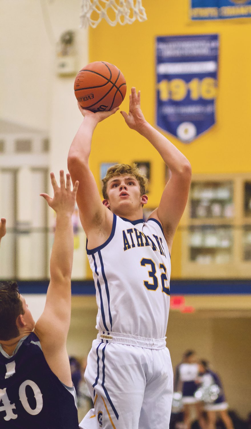 Crawfordsville's Nate Schroeter looks to score for the Athenians in a game last season.