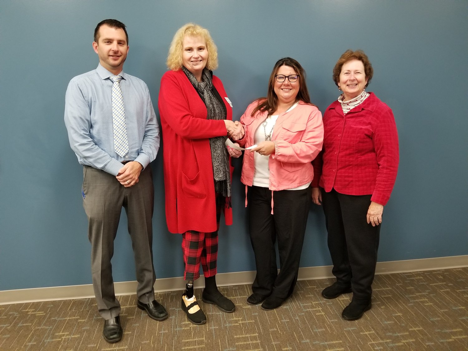 Pictured from left, are, Crawfordsville Middle School
Principal Brent Bokhart, Area 4 Director Lynne Cox,
Active Teacher Grant winner Allison Archer and Montgomery