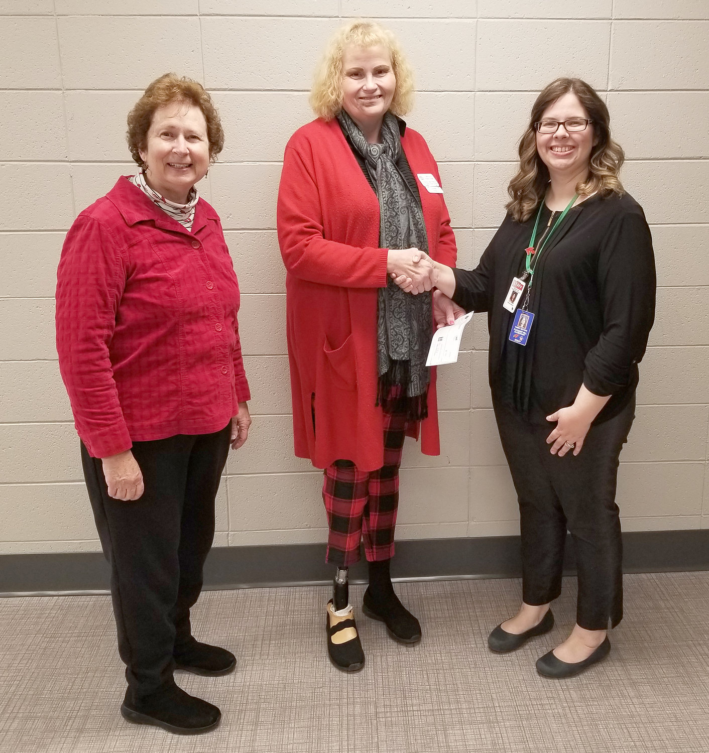 Pictured, from left, are Montgomery County Retired Teacher President Marilyn Spear, Area 4 Director Lynne Cox and Tammy Meyers. Principal Jennifer Merseley was unavailable at the time of picture.