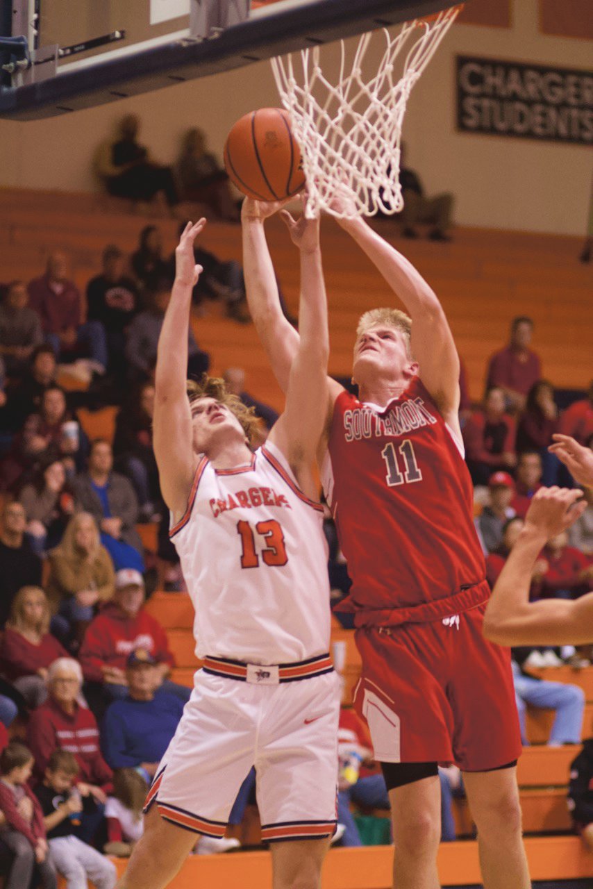 Southmont's Carson Chadd and North Montgomery's Zak Searle battled for position in the paint.