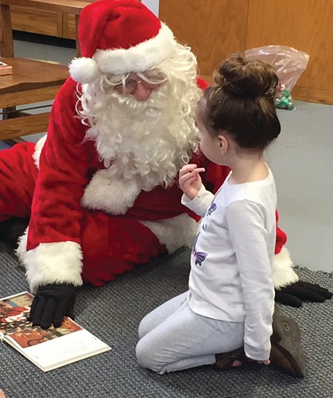 Waveland Public Library celebrated Christmas with a visit from Santa. Alyvia Linthicum can
