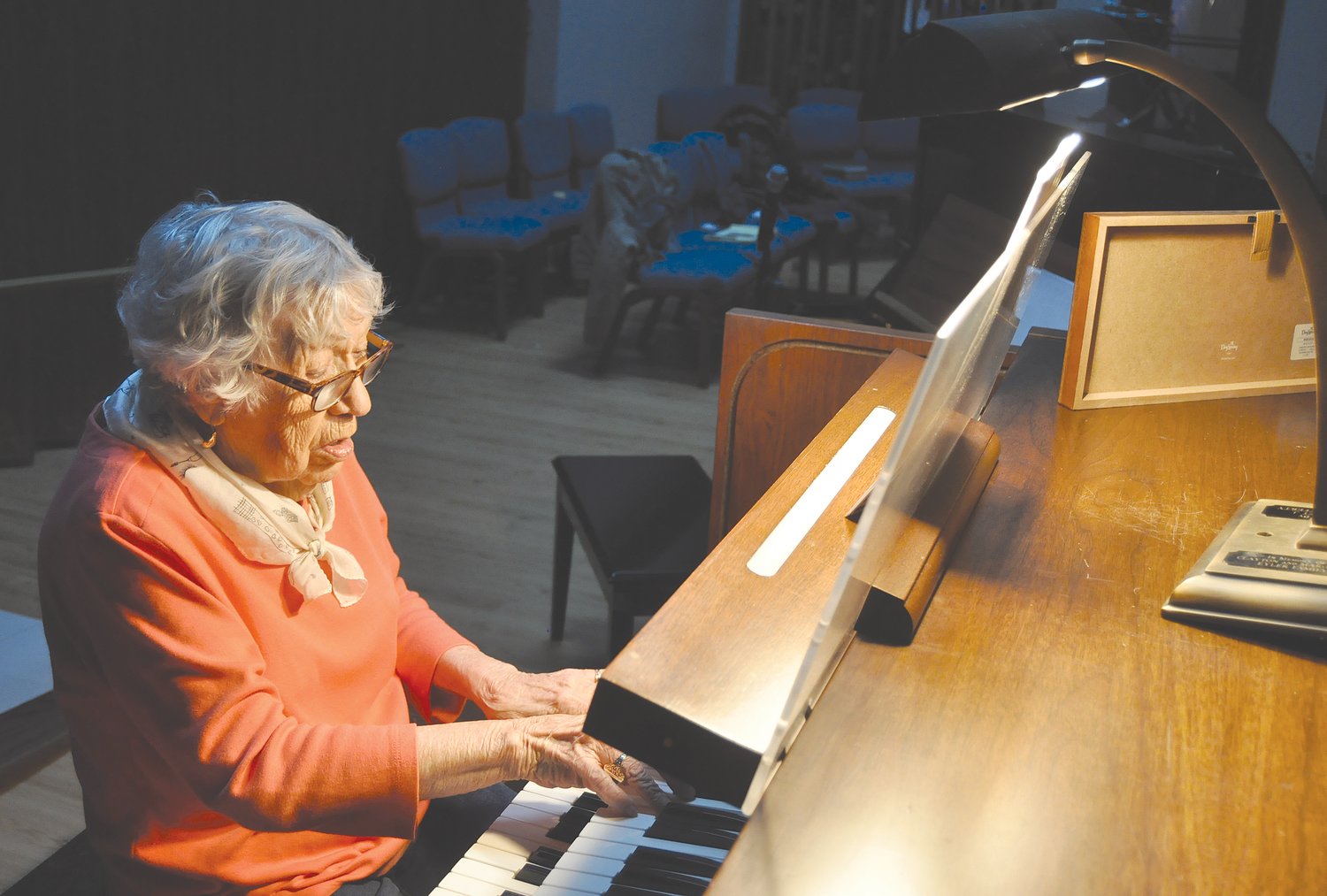 Margy McCafferty plays the organ at St. Bernard Catholic Church. McCafferty retired from playing after nearly 80 years.