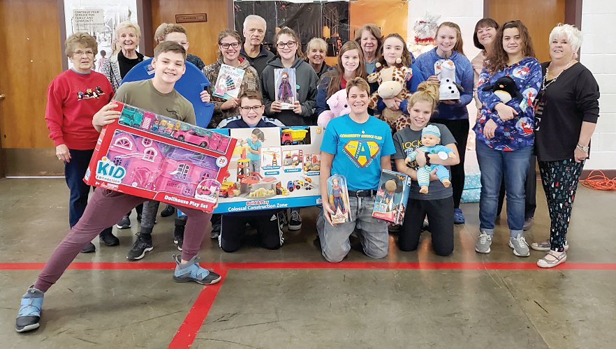 Nothing to do on a winter Sunday afternoon? That was not the case for several middle school students. Members of Crawfordsville Middle School’s A-Team helped members of the Deta Theta Tau sorority sort, organize and display more than 20 tables of toys for this year’s annual Operation: Toy Box at the National Guard Armory. This was the 26th year for the local event. The A-Team is a group of seventh and eighth grade students who represent high standards in character, leadership, academics, service and attitude. The goal of the organization is to provide students with opportunities to become civically engaged community members while participating in fun service activities. Sponsors Shannon Hudson and Laurie Vellner rewarded the group’s hard work with a trip to Culver’s for some rest and refreshments.
