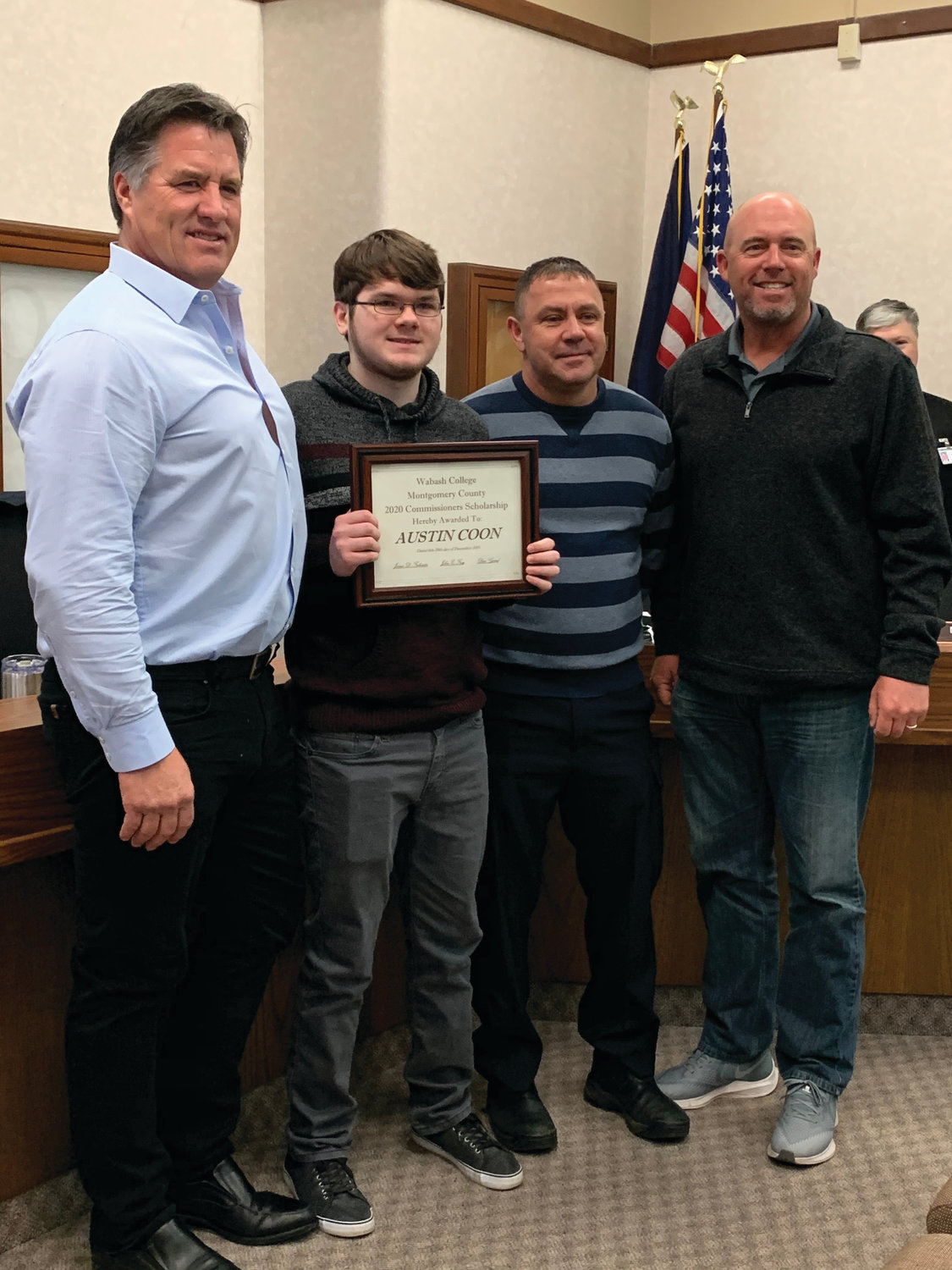Southmont High School student Austin Coon, second from left, is presented with the Wabash College/Montgomery County 2020 Commissioners Scholarship by commissioners John Frey, Jim Fulwider and Dan Guard Friday at the courthouse.