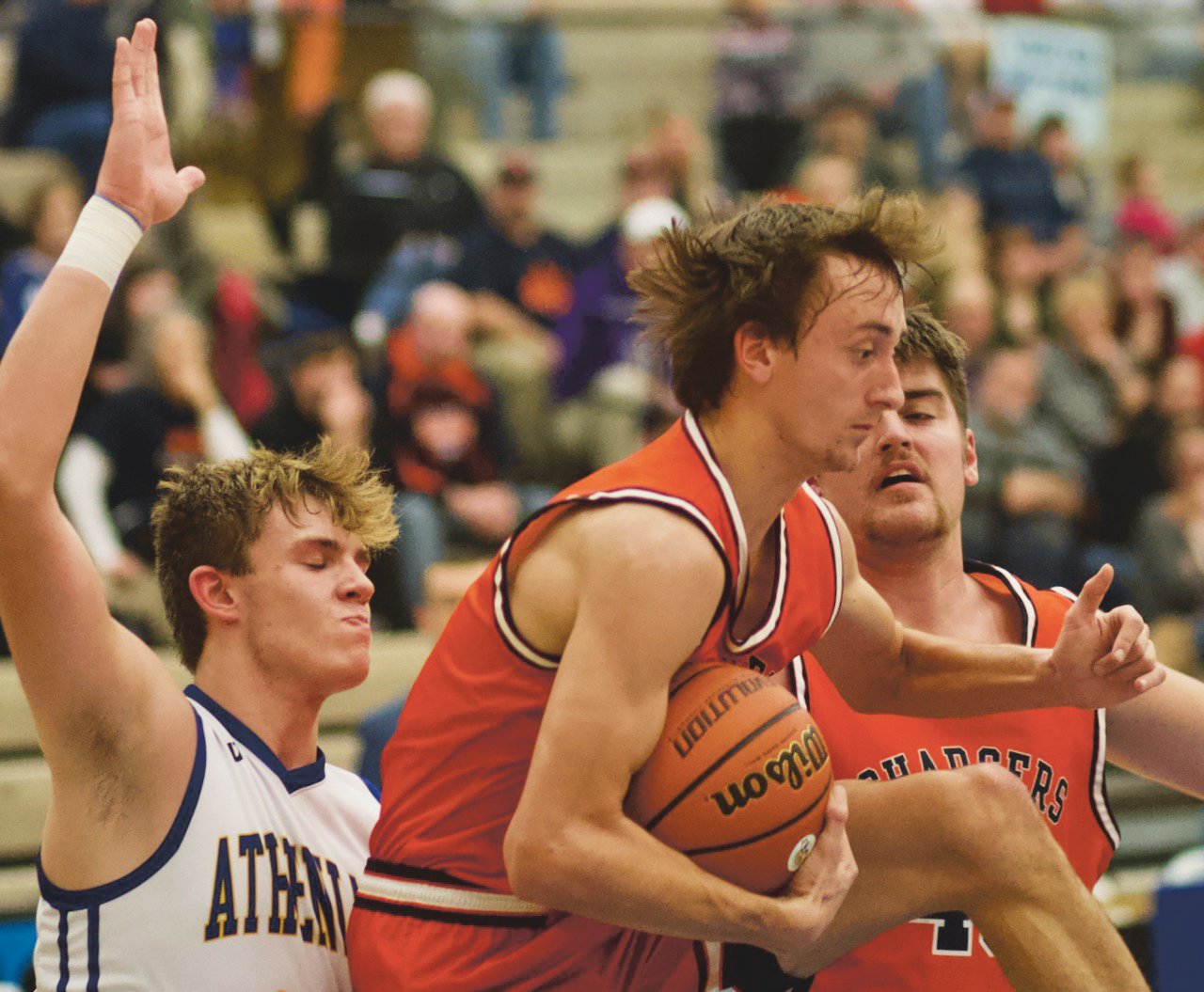 Kade Kobel grabs a rebound for the Chargers.