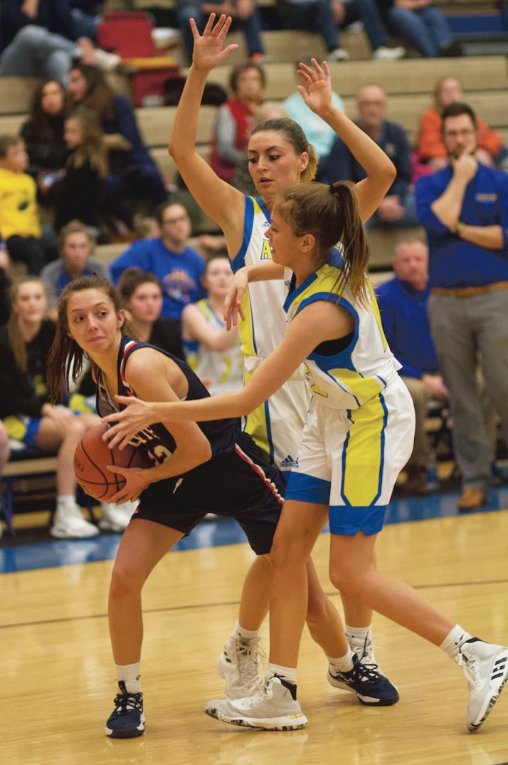 North Montgomery's Maddie Moseley fights for position against Crawfordsville. She led the Chargers with 16 points in their 52-44 win over the Athenians.