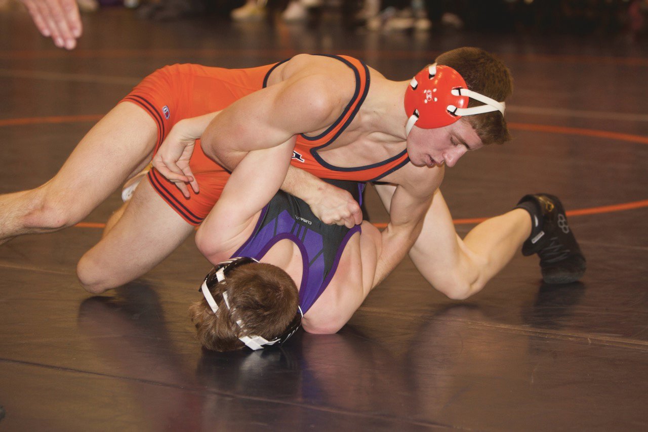 North Montgomery's Baydin Hall works for a pin against Leo.