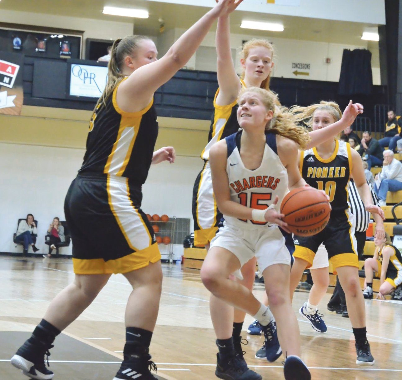 North Montgomery's Madi Welch drives in for a layup against Pioneer.