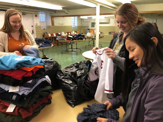 North Montgomery students sort items to place into bags at First Christian Church for the Volunteers for Mental Health in Montgomery County Christmas gift drive.