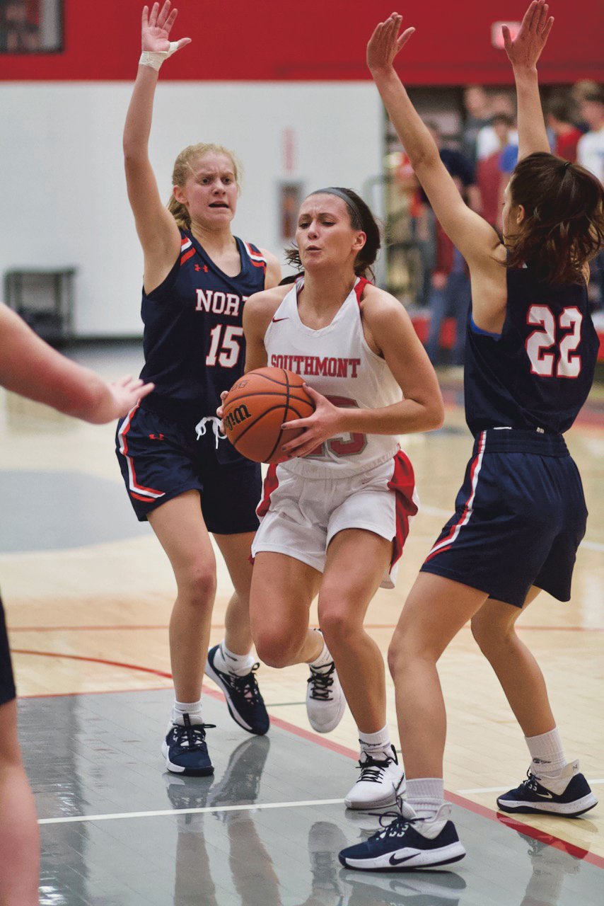 Southmont's Natalie Manion splits the Charger defense. The Mountie junior led all scorers with 18 points in a 55-45 win.
