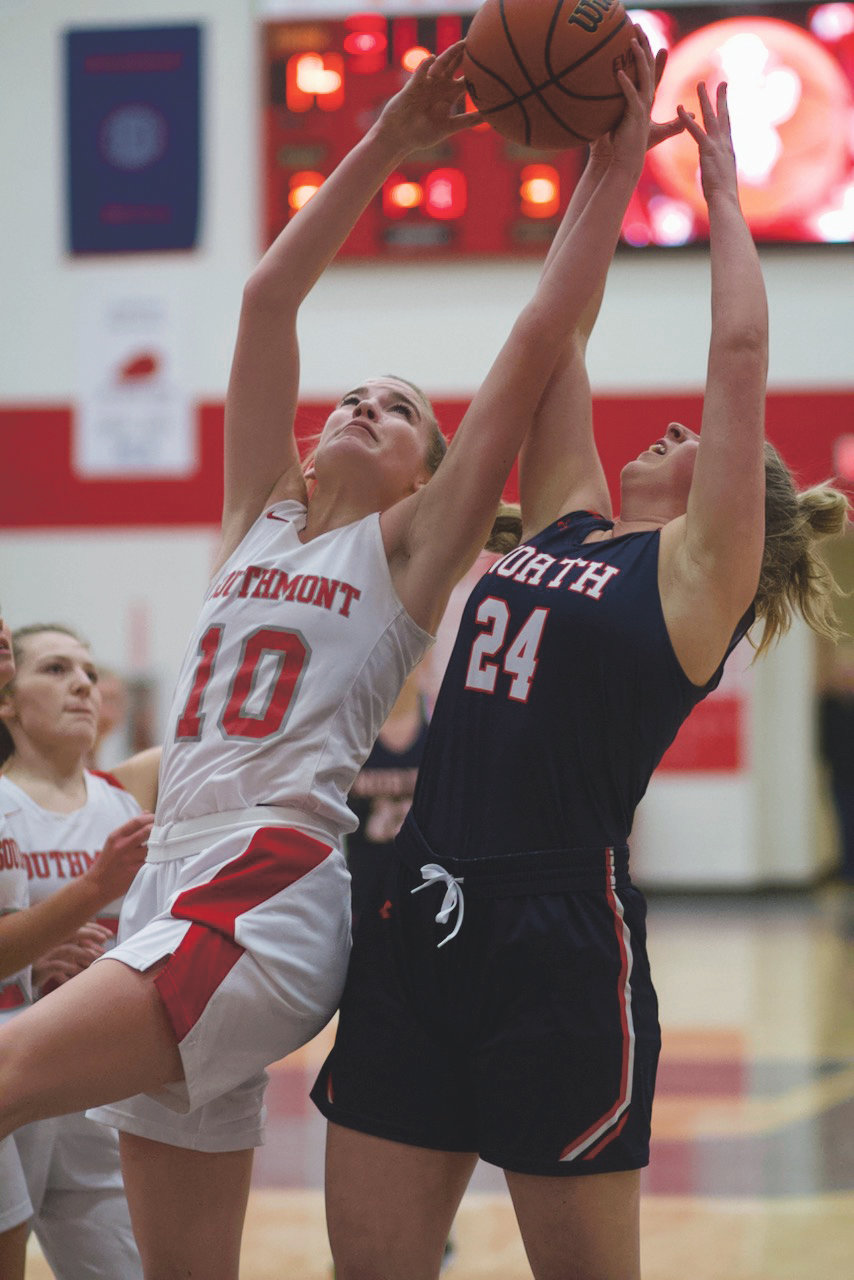 Southmont's Sidney Veatch rips the ball away from North Montgomery's Sidney Zachary. Veatch recorded her 10th double-double of the season in the Mounties 55-45 win over the Chargers.