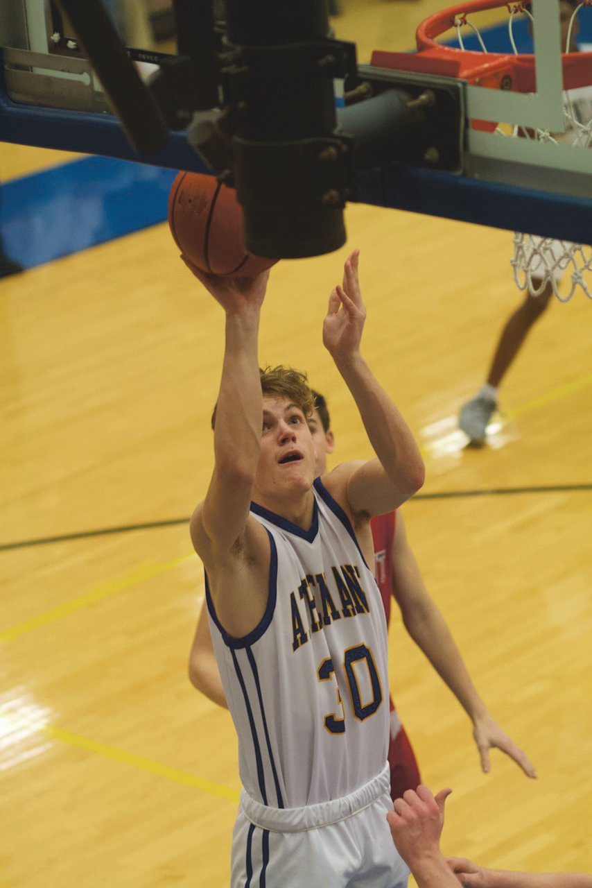 Crawfordsville's Alex Kellerman goes in for a layup.