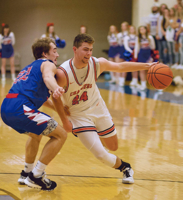 North Montgomery's Alex Wallace draws a foul from Western Boone's Connor Hole.