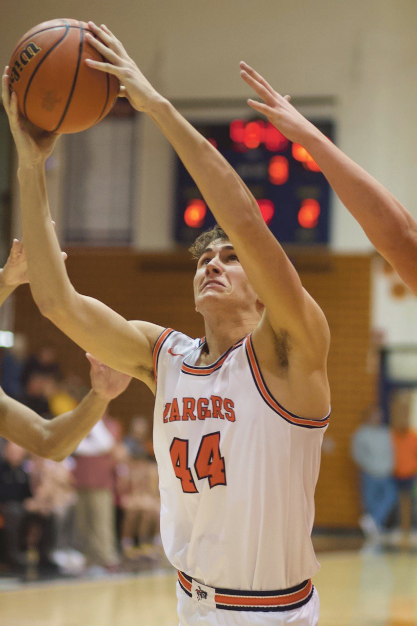 North Montgomery's Keifer Carmean created a spark off the bench with four second half points for the Chargers.