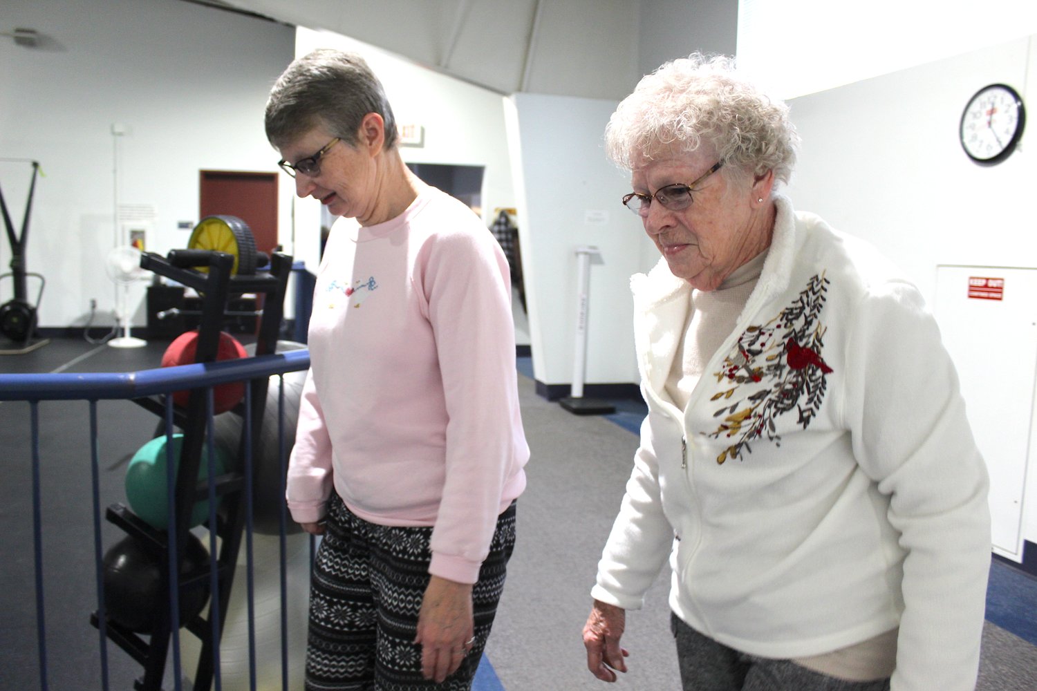 Carolyn Geralds (right) and daughter Betty take advantage of the walking track on the second floor of the Crawfordsville Community Center Monday. Carolyn uses the track to strengthen her knee after having surgery to replace it four years ago.