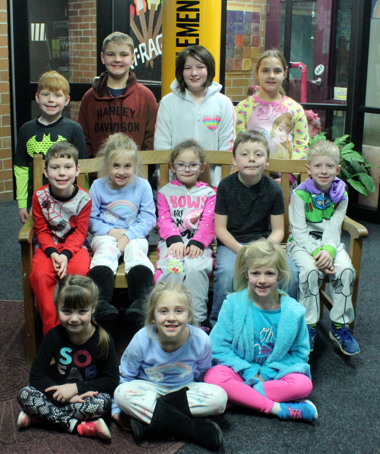 Students participating in the Warrior Watch program are, from left, front row, Petra Schmeltz McGill, Emma HIll and Cobie McCrory; and back row, Aidan Crowder, Abby Hill, Serenity Stanley, Brekyn Posthauer, and Jaxton Shannon; and back row, Koltyn Norman, Eli Thompson, Lorelei Long and Tessa Thompson.