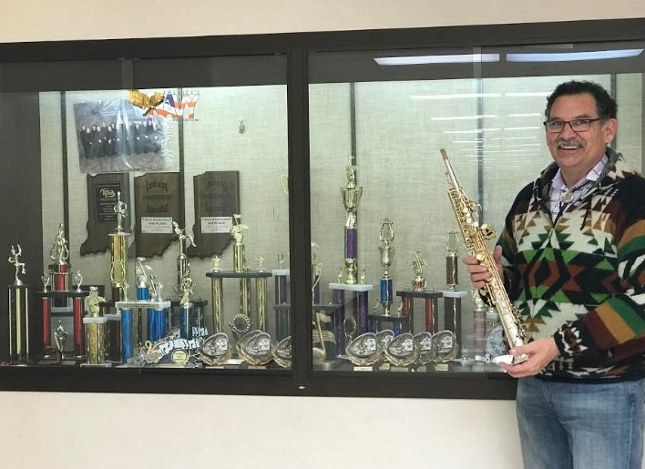 Band Director of Crawfordsville Community Schools Eddie Guanajuato displays the Kenny G-autographed soprano saxophone won through an essay contest hosted by Musicians' Repair and Sales in Indianapolis.