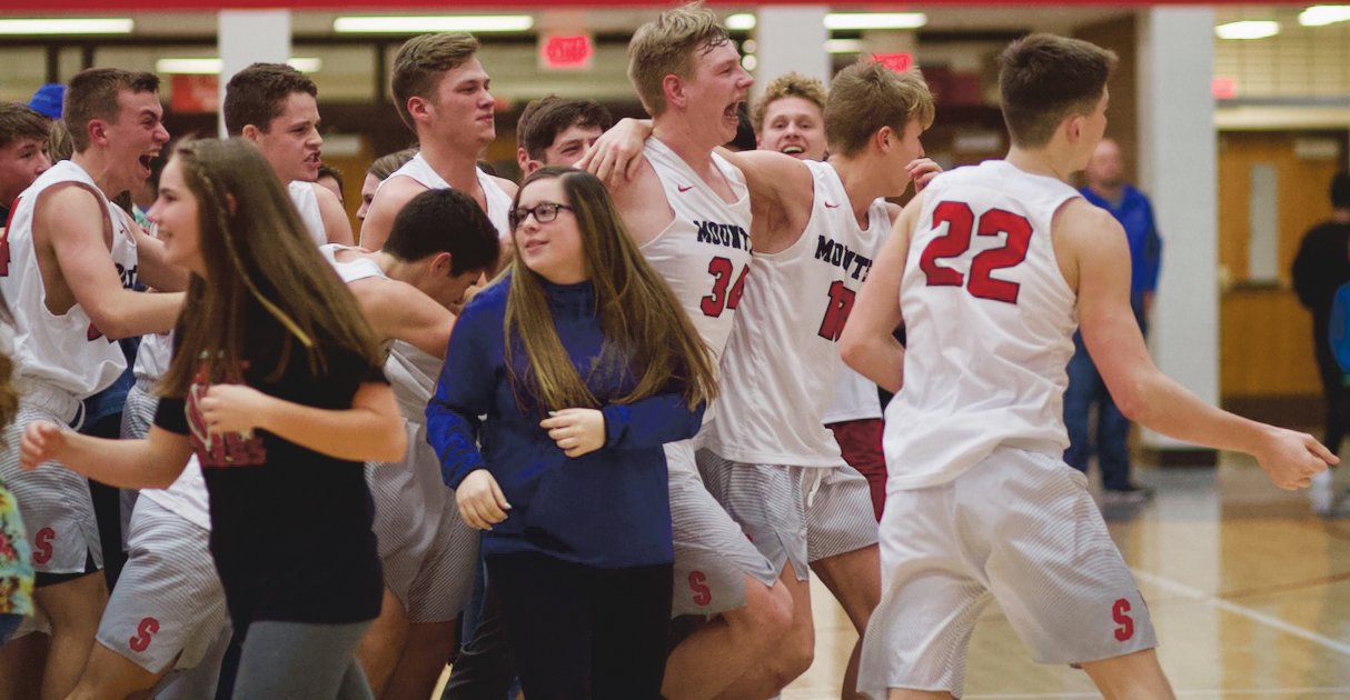 Southmont celebrates Luke Gregg's game-winning shot that sent Southmont to a 58-56 overtime win over Crawfordsville.