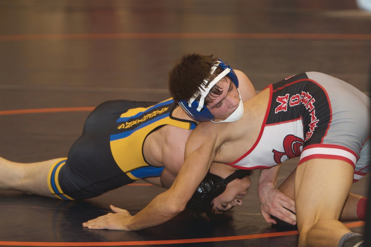 Crawfordsville's Clayton Owens wrestles Southmont's Takeshi Greiner at the Sagamore Conference meet.