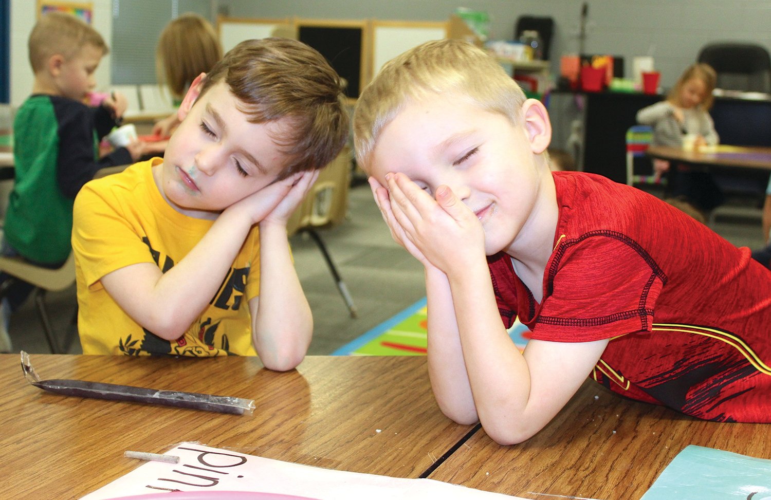 Franklin Skelton, left, and Colton Watson use their imaginations during play time Wednesday at Little Mountie Preschool.