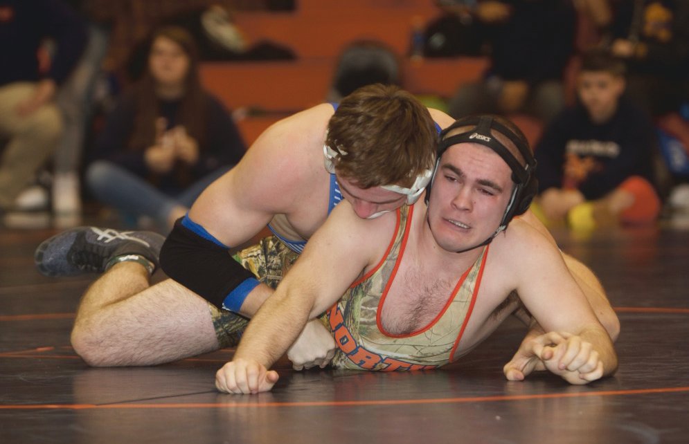 North Montgomery's Dawson McCloud had to come from behin to pin Carmel's Garrett Sharp and secure a place in the regional finals.